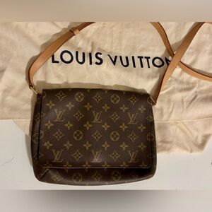 Louis Vuitton fold over bag. More details including measurements coming soon.